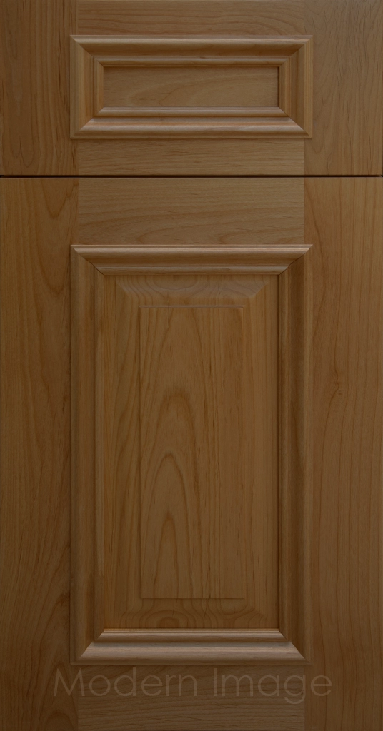 Heritage custom cabinets in a Brown Stain, classic raised panel doors, and modern flat slab drawer fronts.
